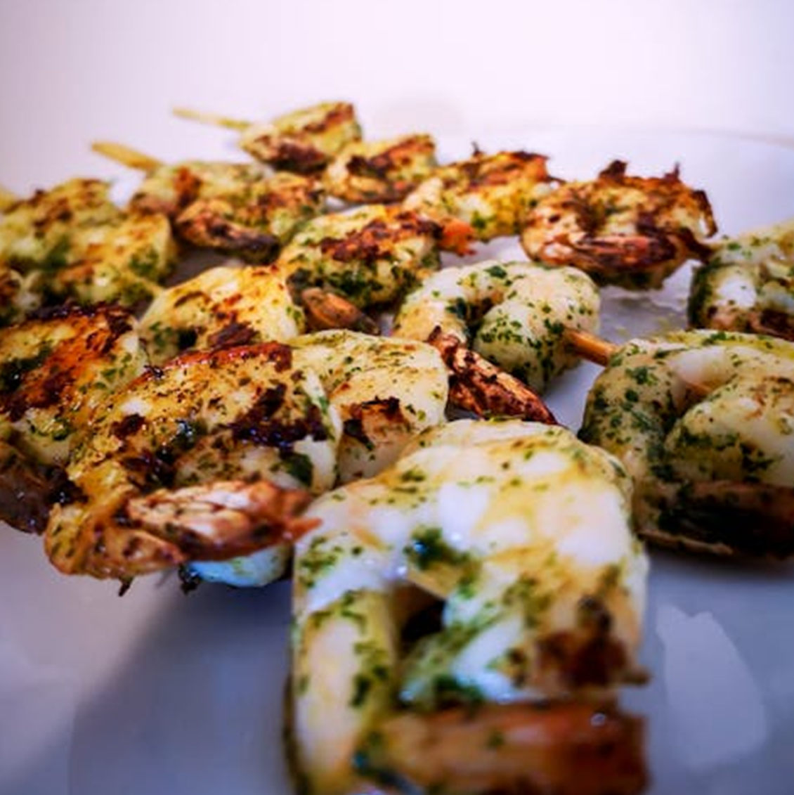Grilled shrimp skewers with garlic herb butter