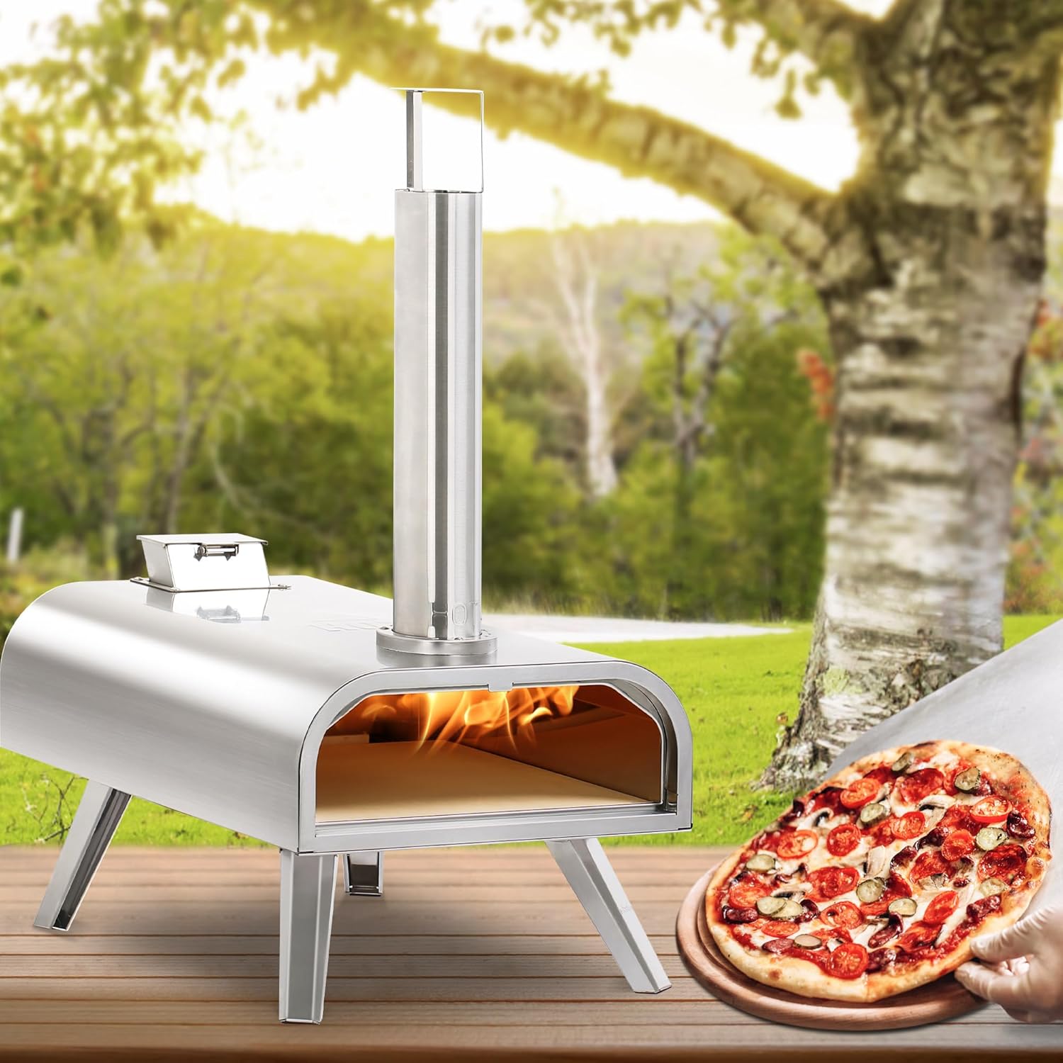 Stainless steel 16-inch Wood Pellet Pizza Oven baking pizza outdoors with a delicious pizza on the table