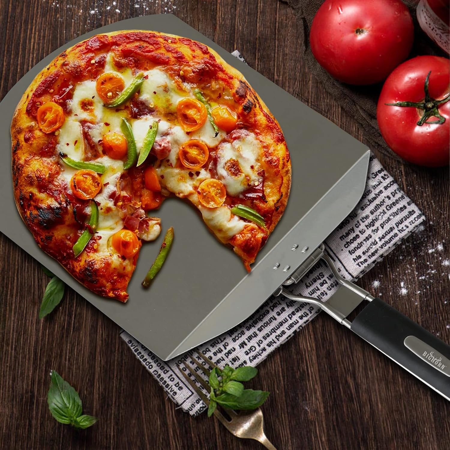 Homemade pizza on a stainless steel Big Horn pizza peel, perfect for easy pizza removal and serving.