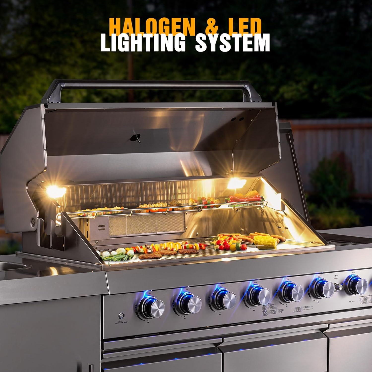 Stainless steel grill with Halogen & LED lighting system, featuring grilled food on display, perfect for outdoor cooking.
