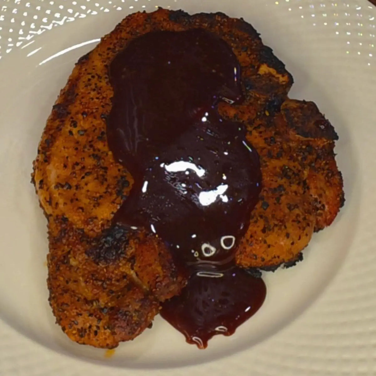 Seared Bone-In Pork Loin Chop with Bourbon Glaze