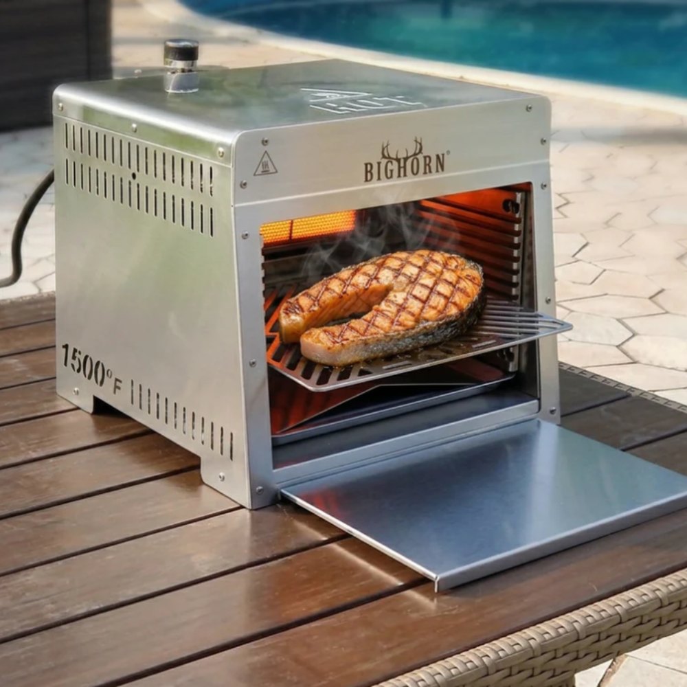 Bighorn stainless steel outdoor grill cooking salmon steak