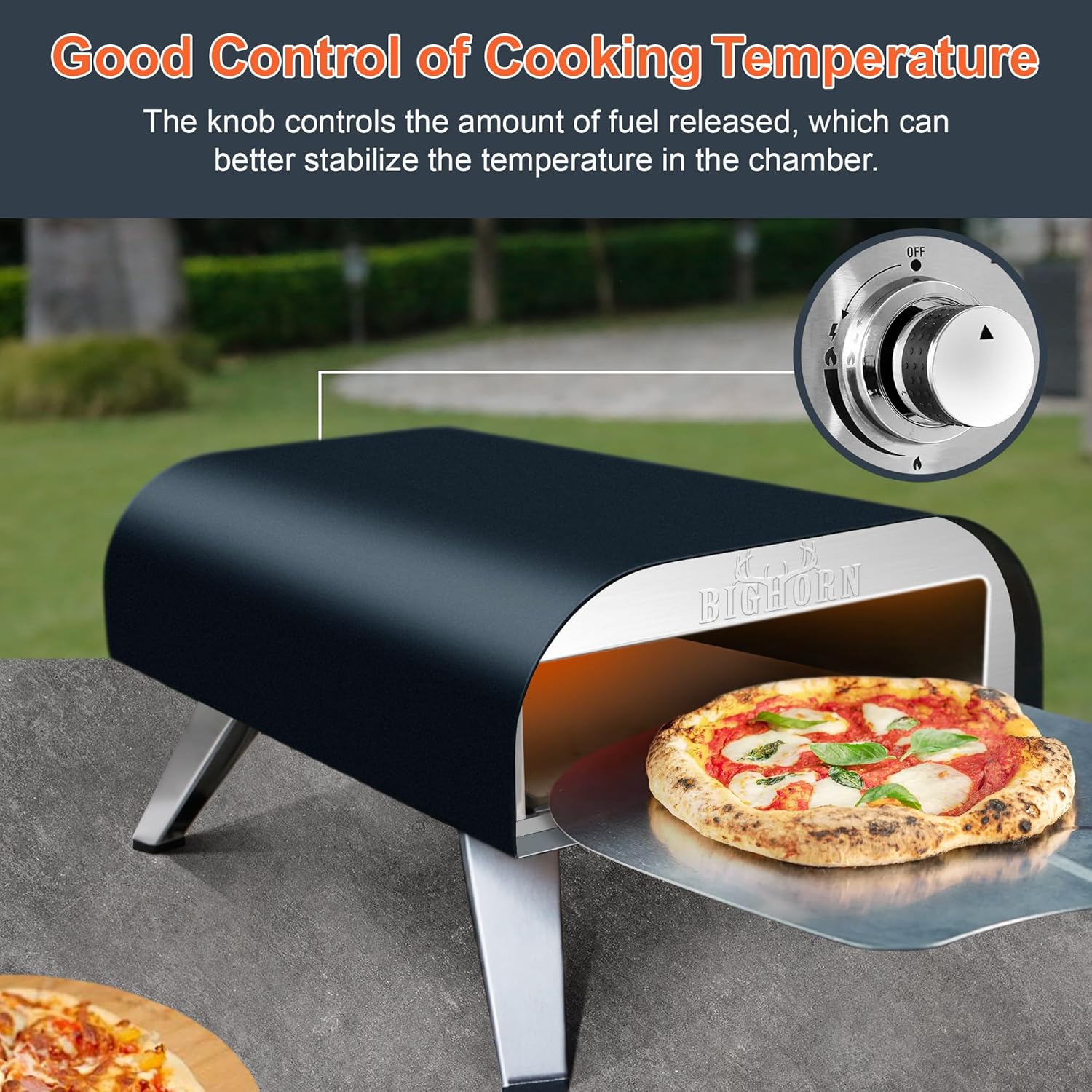 Big Horn 12" Black Portable Gas Pizza Oven with temperature control knob and pizza on peel.